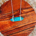 Playful turquoise gemstone necklace in sterling silver, bold and healing design for stacking or statement style.