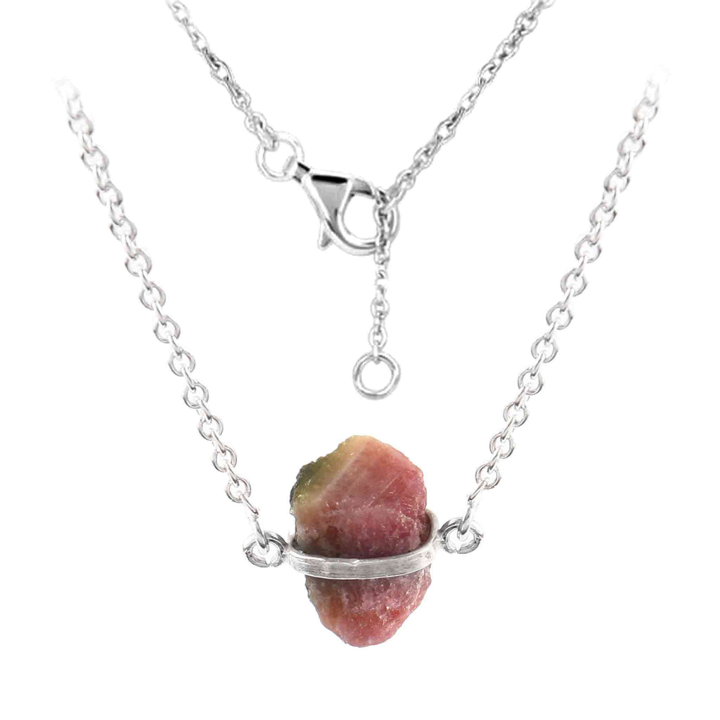 Raw pink tourmaline necklace with sterling silver chain, featuring natural, unique stones in free-form shapes.