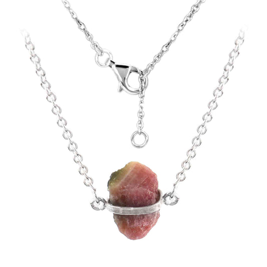 Raw pink tourmaline necklace with sterling silver chain, featuring natural, unique stones in free-form shapes.