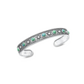 Sterling silver tribal bangle with green turquoise stones and oxidised detail